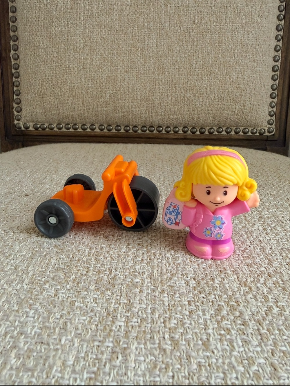 Fisher-Price Little People Emma blonde girl with backpack and orange tricycle